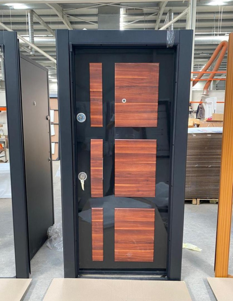 Turkish Luxury Security Door with a black frame with multiple rectangular woonden-look panels