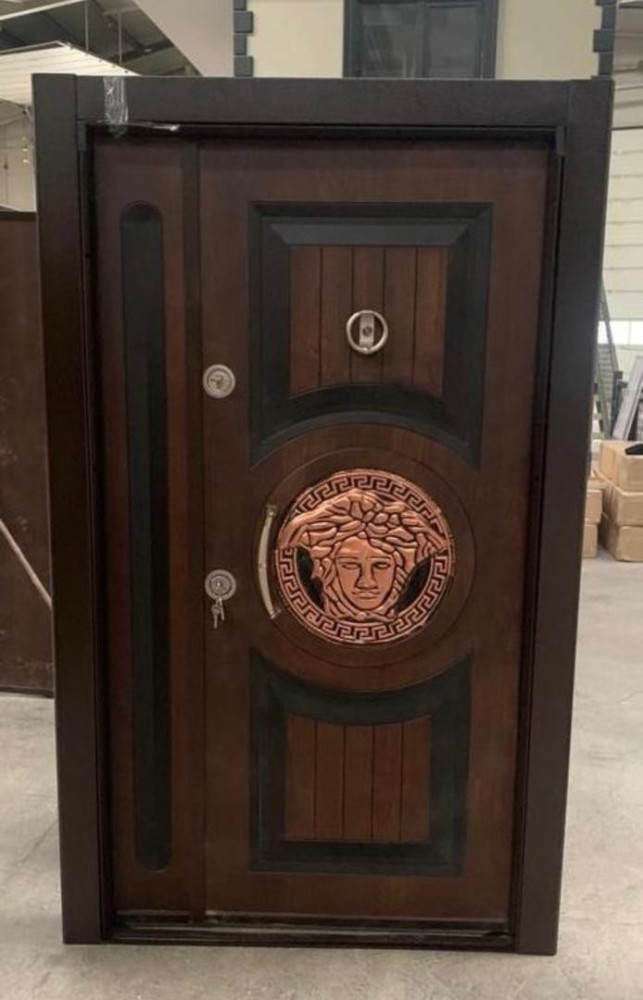 Turkish Security Door feturing a decorative copper Medusa head emblem