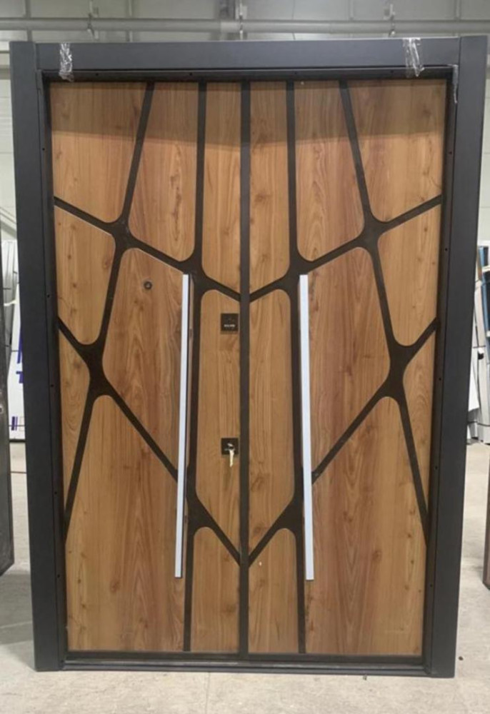Turkish Luxury Security Door features a modern design with a wood finish and black abstract metal overlay