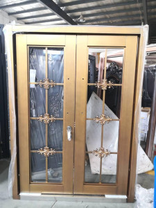 This is a golden electrophoretic aluminum Double casement dor or window with a security grill