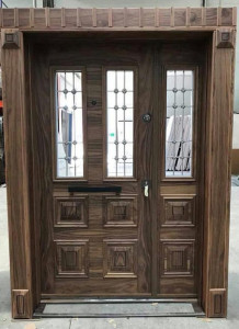 It Features upper glass panels with a decorative grid design
