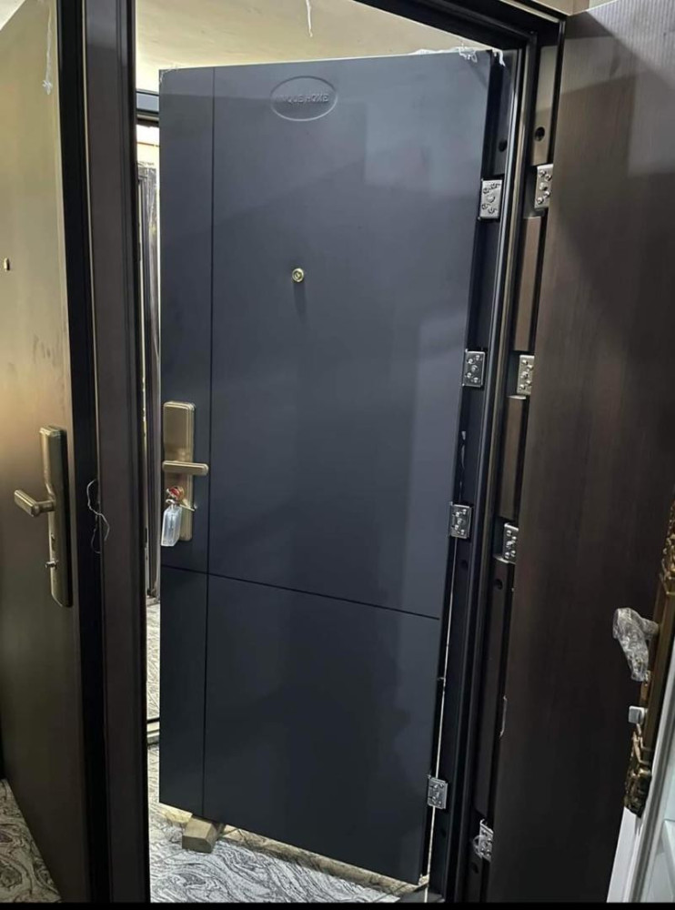 Modern Steel Security door with a two-toned wood-grain finish