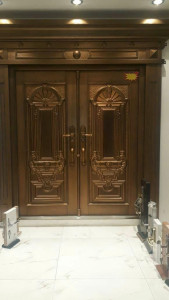 Double Security Steel Door with a copper finish and ornate design