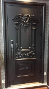 This is a black cast metal security Door