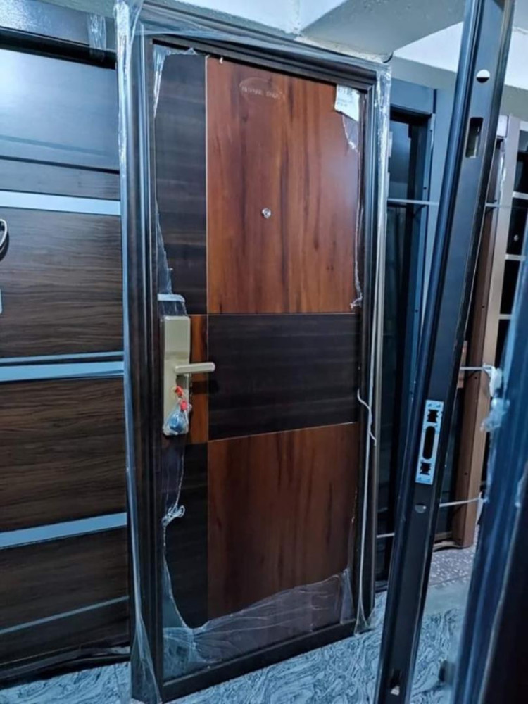 Modern Exterior Steel Security Door with an integrated lock and frame