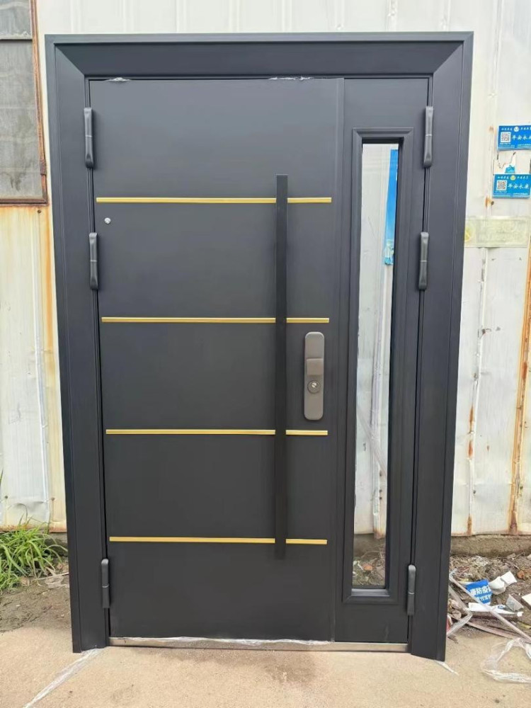 modern, black Steel Security door with gold horizontal accents and a large pull handle
