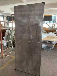 dark grey shiny wooden door