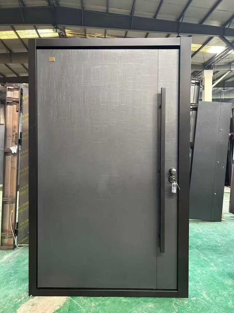 modern security or Exterior door featuring a textured 